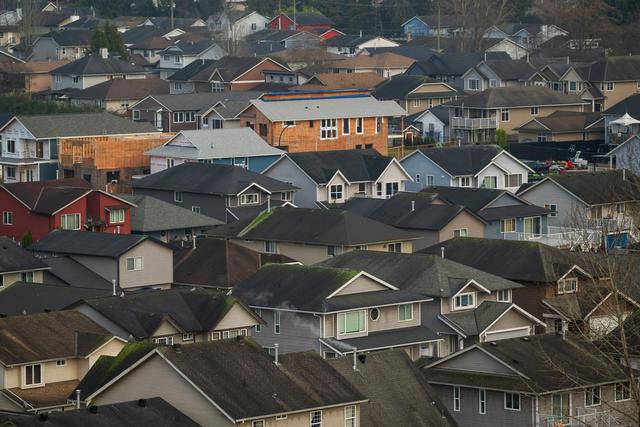 Rooftops of a dense suburban neighborhood