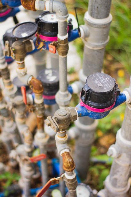 Water meter and shutoff valves used to check for a leak
